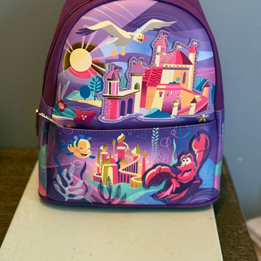 Loungefly Purple Castle & Sebastian Mini Backpack the Little mermaid